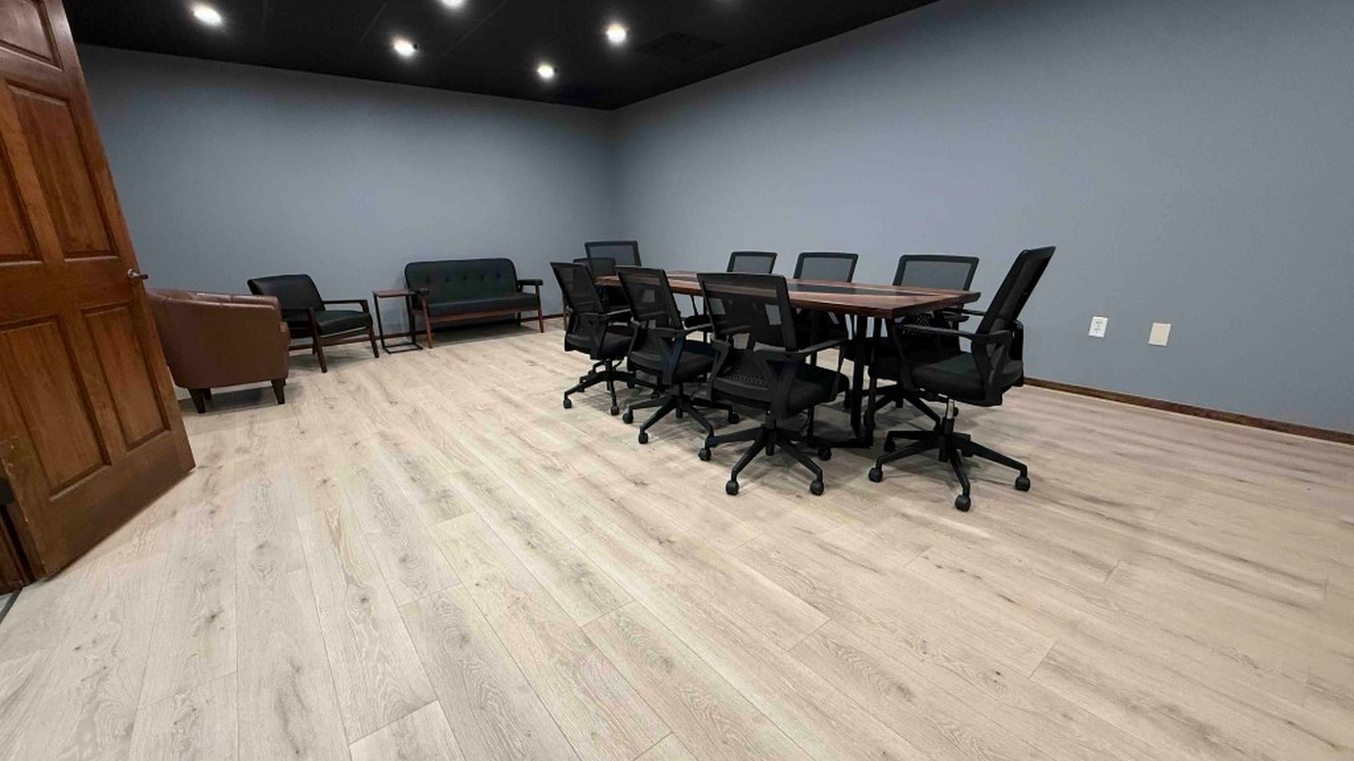 Conference room with lounge seating at Forest West Offices