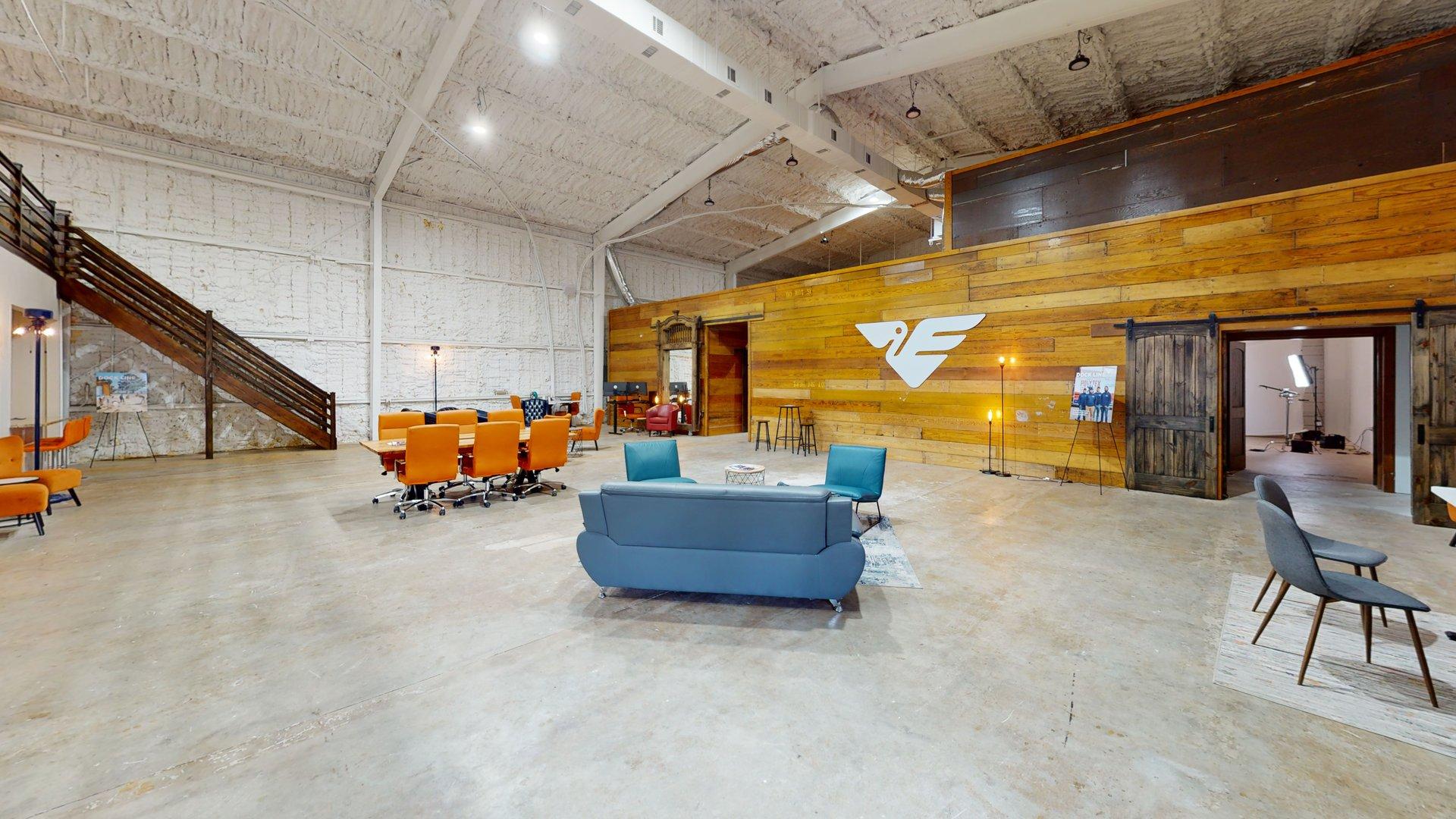 Podcast studio view with seating and acoustic panels